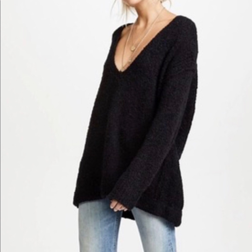 Free people • Black v neck  oversized sweater.
